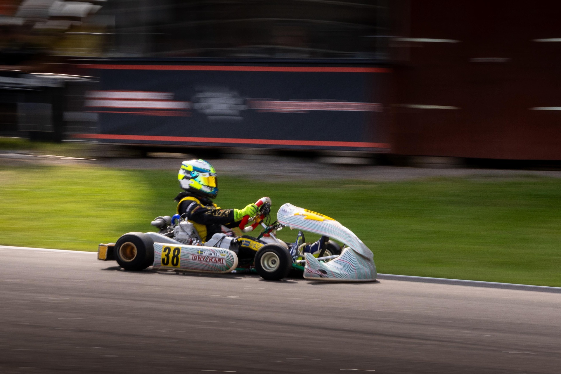 Kevin Pentell on track at speed, panning shot